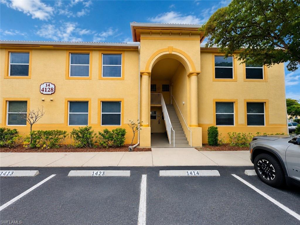 This well-maintained 3-bedroom, 2-bathroom condominium offers 1,045 square feet of comfortable living space in the gated Bellasol community of Fort Myers. Located on the second floor, the home features an open floor plan, vaulted ceilings, abundant natural light, and a functional layout designed for everyday living.

The kitchen overlooks the main living area and features ample cabinet space, a breakfast bar, tile flooring, a full appliance package, and plenty of counter space for meal preparation and entertaining. Adjacent to the kitchen is a dedicated dining area that flows seamlessly into the spacious living room.

The living area offers vaulted ceilings and sliding glass doors leading to a screened lanai, creating an inviting space to relax and enjoy Florida's year-round weather. Neutral colors throughout the home provide a clean and versatile backdrop for any decorating style.

The primary bedroom offers a large walk-in closet and an en-suite bathroom with an oversized vanity and walk-in shower. Two additional bedrooms feature comfortable layouts, ceiling fans, generous closet space, and easy access to the guest bathroom.

Additional conveniences include an in-unit stackable washer and dryer, tile flooring throughout the living areas and bathrooms, carpeting in the bedrooms, window blinds, and assigned parking. Trash collection is included in the rent.

Residents of Bellasol enjoy access to a gated community featuring a resort-style swimming pool, clubhouse, fitness center, and beautifully maintained grounds. The community's central location provides convenient access to Colonial Boulevard, Interstate 75, and Daniels Parkway, making commuting throughout Fort Myers simple and convenient.

Located near shopping, dining, entertainment, medical facilities, and recreational opportunities, this home is just minutes from downtown Fort Myers, the Caloosahatchee River District, Edison Mall, Topgolf, JetBlue Park, Gulf Coast Town Center, and numerous parks and outdoor recreation areas. Southwest Florida's renowned beaches, including Fort Myers Beach and Sanibel Island, are also within easy driving distance.