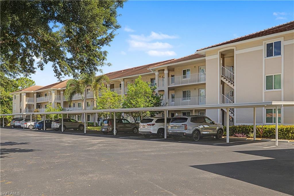 Escape to sunny Naples in this beautifully furnished first-floor condominium in the gated Chatham Square at Glen Eagle. Offering two bedrooms and two bathrooms, this comfortable, well-equipped residence is the perfect seasonal retreat, combining peaceful golf course and lake views with an ideal South Naples location just minutes from beaches, dining, and shopping. The bright, open living and dining areas flow seamlessly to the screened lanai, where tranquil fairway and water views create the perfect setting for morning coffee or relaxing after a day exploring Naples. The well-appointed kitchen features a pantry, breakfast nook, and convenient pass-through to the dining area, making everyday living and entertaining easy. The spacious primary suite overlooks the lake and golf course and offers a walk-in closet and en-suite bath. A separate guest bedroom and full bath provide comfort and privacy for visiting family and friends. Additional conveniences include in-residence laundry, a covered carport, and the ease of first-floor living with no stairs. Guests enjoy Chatham Square's private community pool and barbecue area just steps from the front door. An optional social membership to Glen Eagle Golf & Country Club is available for $375 and provides access to tennis, fitness facilities, clubhouse dining, a resort-style pool, and an active social calendar. During the off-season, golf is available on a pay-to-play basis. Ideally located in South Naples, you'll be just minutes from the white sand Gulf beaches, the boutiques and restaurants of Fifth Avenue South and Third Street South, and the natural beauty of nearby Marco Island. No pets and a minimum of a 30-day rental per HOA.
