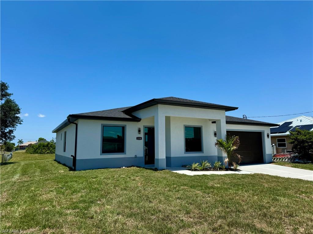 Exceptional opportunity in NW Cape Coral! Beautiful new construction 4-bed, 2-bath home with 1,735± SQFT of thoughtfully designed living space. Bright open floorplan with cathedral ceilings, pantry, walk-in closets, tile floors throughout and modern finishes. Includes a 2-car garage, tray ceiling accents, and quality appliances. Located on a generous 10,019± SQFT lot in a desirable Cape Coral neighborhood. Perfect for families or investors — don’t miss your chance on this stunning property!