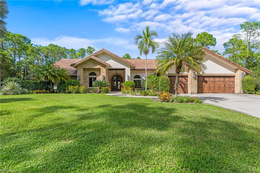 Presenting an exceptional opportunity to own 5.46 acres a fully fenced and electrically gated compound tucked within the quintessential neighborhood of Collier Woods.  It is ideally situated within the preferred “X” flood zone. The main house features gorgeous curb appeal, a circular driveway, wood cabinetry, solid wood core doors, a full-house reverse osmosis water system, 1000 gallon propane tank, a whole-house generator, a separate generator for a propane tank for the well pump, a custom pool/spa, and a mature landscape with fruit trees, landscape lighting and an automatic sprinkler system and more! The 3700 sf main home features 5 bedrooms + Den, 3 1/2 baths, and an air-conditioned 3-car garage. This idyllic location will give you the privacy of country living while just minutes away from shopping, dining, and Naples's pristine beaches. Agents, please read the remarks.