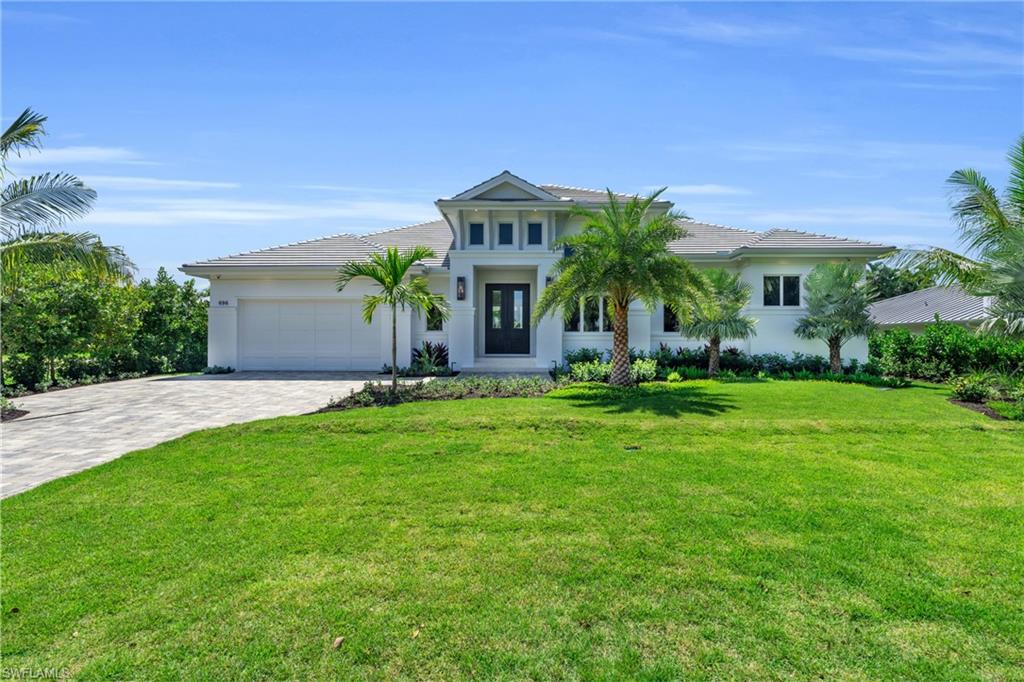 Just completed luxury home by Borelli Construction. This floor plan has it all with the great room design, large kitchen with plenty of storage, working pantry, four bedrooms, four full baths and a cabana with half bath connected by a breezeway. The southern exposure plus northern and western windows let in tons of natural sunlight along with fully pocketing 10-foot tall sliders. Inside, European wide plank white oak runs throughout and detailed trim work on the ceilings define the spaces. The primary suite features a massive closet, marble bathroom with dual water closets & wet room, plus sitting area in the bedroom. The salt-water pool is oversized and inviting with a sun shelf and spa. The pool deck is perfect for lounging and on the other side there is a sunken fire pit; both flanked by lush planters. Many high-end upgrades including hard-wired electric shades, Control4 home automation, Lutron lighting automation, SubZero/Wolf appliances, bi-folding doors, screens and shutters over lanai, 1,000 gallon propane tank, whole-house generator, and fireplace & white washed cypress ceiling in lanai. This home is built a foot over the new FEMA base flood elevation.
