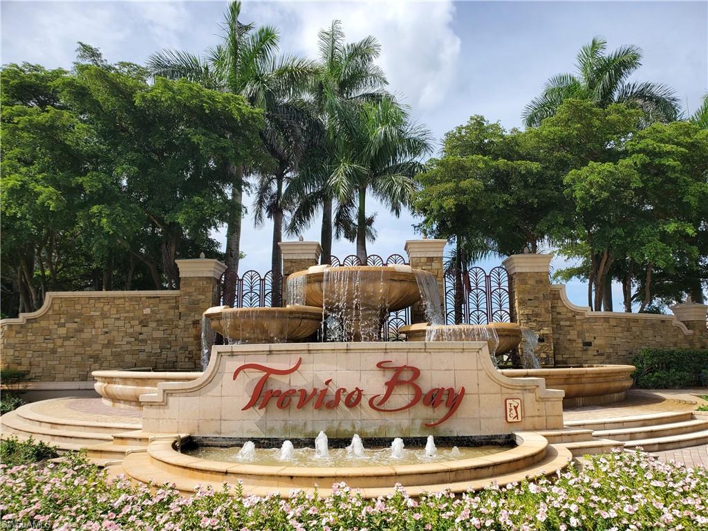 Fully furnished, well-maintained 2 bedroom/2 bath plus den first-floor condo with detached garage within the gated, elegantly landscaped resort-style community of Treviso Bay.  Available off-season June through September 2026 for $2,175/mo plus fees and November and December 2026 for $2400/mo plus fees. The amenity rich social membership included with this home provides for access to dining at both the Clubhouse and casual dining at the lagoon-styled pool, fitness center & studio, spa, pickleball, satellite pool, tennis courts, bocce, social events, and golf opportunities at public rates from May 1 through October 31. This home offers two lanais, one overlooking the expansive lake, a master ensuite and guest bedroom both furnished with king sized beds, a queen-sized sleeper sofa in the den with pocket doors for privacy for the occasional overnight guest. Smart TVs are in each bedroom and the great room. Treviso Bay is conveniently located within just a few miles of 5th Avenue South, Third Street South, fine & casual dining, shopping, and the beautiful Gulf beaches, entertainment and more.