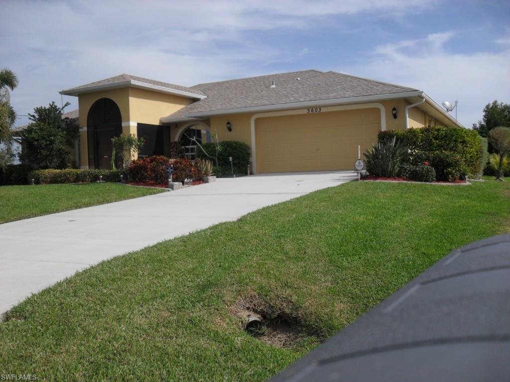 THIS HAS BEEN AN EXCEPTIONALLY "WELL CARED FOR" HOME....SPACIOUS AND CONSTANTLY UPDATED..New upgraded carpet in living, dining & master bedroom (2013); 18 SEER Trane HVAC (2011), New Water Htr in 2013, entire attic and roof sprayed with foam to reduce heating/colling costs and add additional roof security, NO FLOOD ZONE, kitchen upgraded in 2011 @ granite counters/new wood cabinets, house painted in 2013, monitored "wireless" alarm/smoke alarm reduces insurance, automatic sprinklers, Jacuzzi & walk in shower in master bath, ceiling fans in every room including bath, all wood shutter window treatments go with home, gray water hook up PLUS a well, cabinets in garage and laundry room remain, all windows tinted for heat reduction, surge protector on AC and home, Door from guest bath to access patio or canal,  Room for a pool !!! Landscaped professionally, 
Cathedral Ceilings in Family Room/Living & Dining areas....and....Washer & Dryer negotiable.  Additional digitals available if desired.  Property for sale "As Is" with right of inspection.