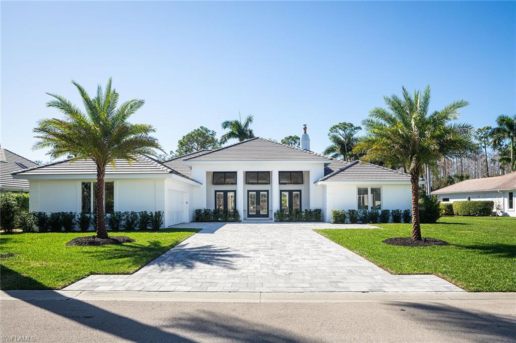 Chic and sophisticated with a clean European flair, this spectacular renovated residence provides incredible southern views highlighted by pocketing walls of glass that bring the outdoors in. Outstanding one-level floor plan with multiple living areas featuring warm oak flooring, detailed millwork and plantation shutters throughout. Open-concept kitchen boasts crisp white custom cabinetry, stainless steel appliances and classic marble countertops. Fresh, relevant design flows through all spaces, including private owner’s suite with spacious marble shower, floating tub and walk-in closet. Newly installed saltwater pool highlighted with sunken spa and sun-shelf with water feature. Numerous outside entertaining areas, complete with travertine, Red Grandis ceilings and outdoor shower, give the feeling of life in the tropics.