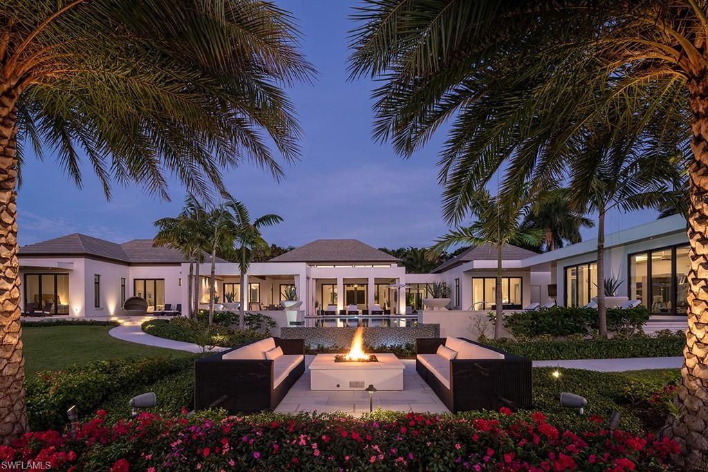 Engaging spatial relationships designed to indulge owners and guests with a sense of peace and privacy while also offering the opportunity for entertainment on a grand scale. The entire south end of this magnificent home is dedicated to a well-conceived first floor master suite encouraging a personal place of healing and resting. The great room is expansive and has an impressive synergistic relationship with the dining area, wine room, modern kitchen, and extraordinary outdoor dining and living areas. Two en suite guest bedrooms and a beautifully located VIP suite complete the northwest area of the home. The outside pool and pool deck are nothing less than glorious and the associated gardens, cozy sitting areas, and cabana/bedroom are all stunning. The area is romantically and creatively lighted at night and flooded with sunshine during the day. Sail from your dock to the Gulf of Mexico with no bridges. Port Royal Club membership eligibility.
