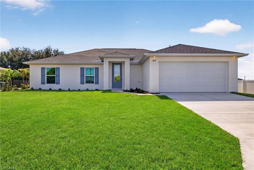 $18,000 (5%) CLOSING COST CREDIT AVAILABLE! Whole House Plank Tile! New construction - built in 2026, This move-in ready 4-bedroom, 3-bath home offers 1,818 SQ ft of thoughtfully designed living space, delivering exceptional value with modern upgrades and energy-efficient construction. Designed for today’s lifestyle, the open-concept layout seamlessly connects the living, dining, and kitchen areas, creating a bright and functional space ideal for entertaining and everyday comfort. The kitchen features quartz countertops, stainless steel appliances, ample cabinetry, and a modern design that anchors the heart of the home. Impact-resistant windows and doors provide added security and peace of mind. A highly desirable two-primary-suite layout offers flexibility for multi-generational living or hosting guests. Each primary suite includes a walk-in closet and en-suite bath, while two additional bedrooms and a third full bath provide space for family, a home office, or hobbies. Step outside to a covered lanai perfectly sized for an outdoor dining table, grill station, and seating, ideal for weekend barbecues, morning coffee, or relaxing evenings enjoying the Florida weather playing a game of cards. The backyard offers room to personalize your outdoor space to fit your lifestyle. Additional features include upgraded flooring throughout, a nicely sized laundry room, and a smart garage door opener for convenience and security. Located in a growing area of Cape Coral with easy access to shopping, dining, parks, Fort Myers, and Southwest Florida beaches, this home is ideal as a primary residence, vacation home, or investment property. Schedule your private showing today and experience affordable new construction living in Southwest Florida. One or more photos are virtually staged. This is the Sunset Harbor Plan