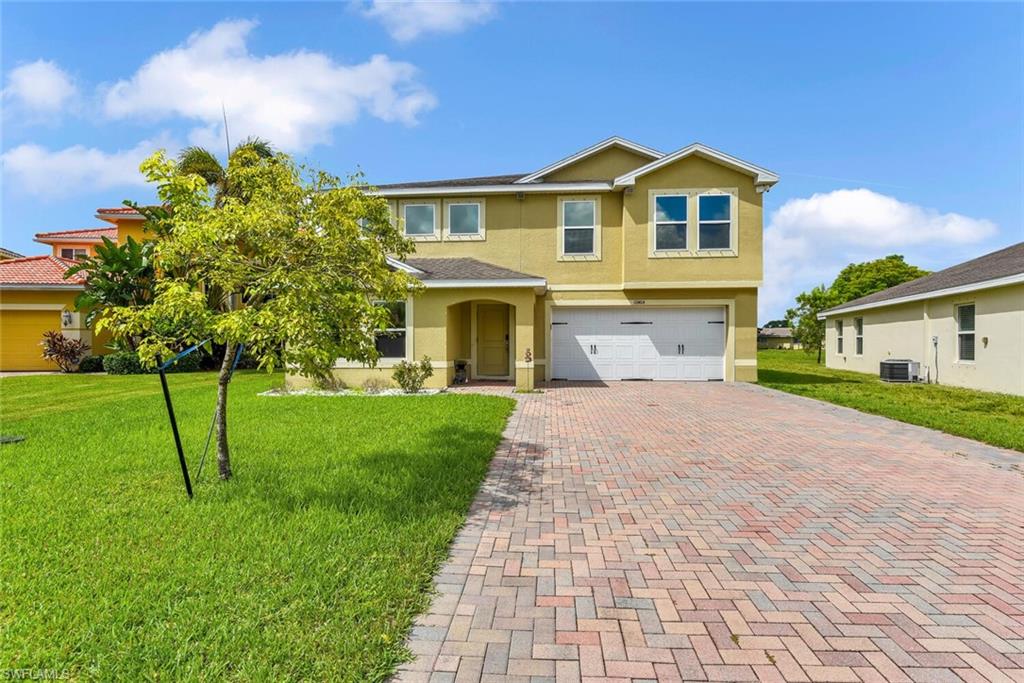 Fantastic sprawling layout! This 2-story design is situated on an oversized lot in a gated community. The first floor offers a formal front sitting room, formal dining room, open concept kitchen w/ breakafast nook, custom sliding barn doors on sliders to lanai, family room, guest room, full bath, and a 2-car garage w/ a/c & epoxy floor. On the second floor you will find a massive bonus room, laundry room w/ storage, master suite, 3 guest rooms, and one full bath. This home absolutely has enough room for everyone in the family and has plenty of room to add a pool. Generator hook-up and manual shutters available for optimum storm protection. There is an alarm system w/ cameras & RING system for home security. The a/c unit is only 1 year old. Marblebrook has a lakefront community center, is close to lots of shopping/dining options, and is right across from the Veterans Park which offers tons of activities!