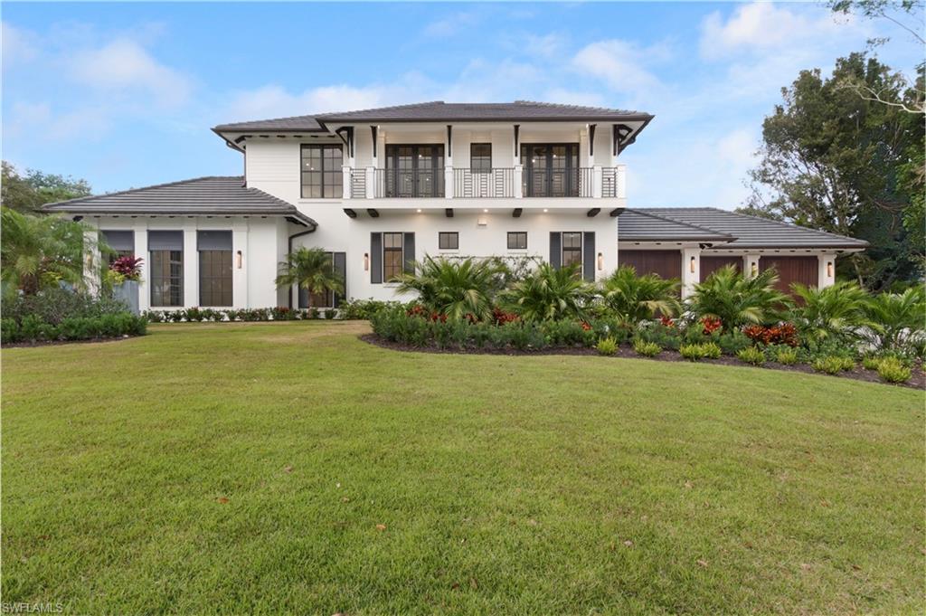 REDUCTION $200k Stunning, show stopper corner property. This 2019 new construction is one you will want to see. As you enter this beautiful, bright home you can not help but notice the eye catching marble floors, open floating staircase, soaring tray ceilings and large Andersen impact windows. No detail was overlooked here. The gourmet kitchen is outfitted with wolf appliances, sub zero, lots of cabinet space, pantry, wine cooler along with cristallo quartz counter tops throughout. The home offers 4 very generous size bedrooms, four and a half baths and a 3-car garage. For your convenience there are two laundry rooms one upstairs and one down. Extend your entertaining outdoors with a drop dead gorgeous floor to ceiling marble fireplace alongside and impressive outdoor kitchen, salt water pool, spa and decorative fire feature. You will also find a 1 BR guest house for the overflow of guest. Pelican Bay is one of the most sought after locations. You are just blocks away from Waterside Shoppes, dining and Artis Naples where you catch a broadway show. Or just take the tram to the beach where you can have lunch at one of the two restaurants or just sun bath all day.