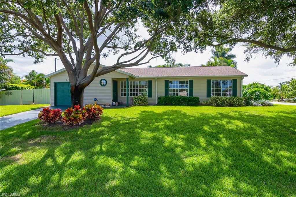 Lovingly referred to as "Lyn Lane", 3190 52nd Lane SW is located directly across from St. John Neumann high school. Lucky for you, this meticulously maintained home has been very gently used over the last 17 years and is currently available for sale. You are sure to enjoy the beautiful landscaping, private fenced area for your pets, deck for your BBQs and gorgeous over sized corner lot. The mature trees have been recently trimmed and the roots are also regularly trimmed. Enjoy being 20 minutes to the beach, 5 minutes to the highway and great local restaurants.

There is a new (August 2018) TRANE air handler and condenser which has had regular maintenance. Regular service and maintenance on the reverse osmosis water system and the pumps are covered to extend their use. Custom plywood hurricane shutters made in 2018, labeled and custom fitted to each window for easy placement.  There has been security tint added to the sliders for additional privacy, new light fixtures on the exterior of the home to illuminate the deck, above the garage and by the front door. The faucets in the kitchen and bathroom are newer. RIDEX is used every month to maintain the system and has never backed up.