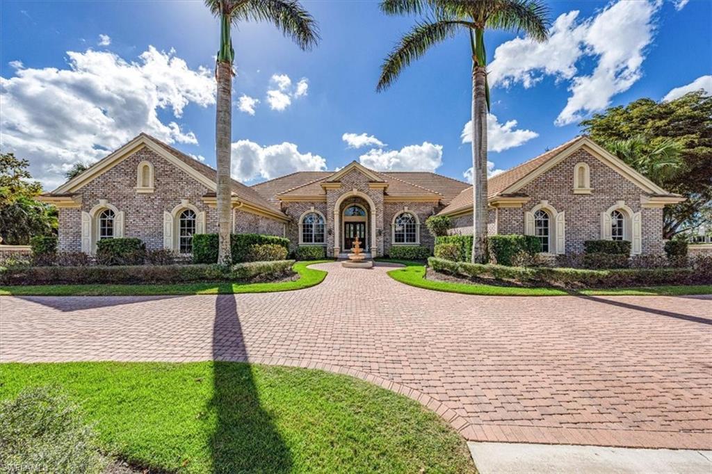 H9252- TRANSFERABLE BEACH CLUB MEMBERSHIP INCLUDED! Enjoy unobstructed water and golf course views from this classic Quail West estate home. Strategically set on an acre of land at the end of a private cul de sac, this home exudes quality and tranquility. Solidly constructed and masterfully designed with a thoughtful layout by Arthur Rutenberg custom homes, the home is ready to be reimagined to your own taste. A massive kitchen with oversized breakfast bar and island opening to family room and breakfast area is surrounded by glass doors and windows to allow plenty of sunlight and cheer. The split floor plan offers privacy for residents and guests alike and the generous room sizes are a plus. The large lanai with a western exposure, outdoor kitchen, spa and custom pool offers plenty of sunshine during the day and gorgeous sunset views in the evening. New roof in 2020