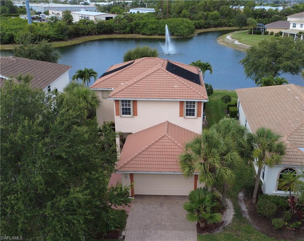 Wonderful Manors Collection "Hemlock Model" Lakefront Pool Home in the gated community of Coral Lakes. This 
Beautiful home is ready to move in immediately. Coral Lakes is 20' above sea level in FLOOD ONE X and doesn't require flood insurance. The kitchen has been completely remodeled with quartz countertops and stainless-steel Samsung appliances. New tile floors downstairs in 2011 and new carpet upstairs and stairwell in 2021. A New Trane air conditioner was installed in 2018. The pool has a new pump and motor in April 2022, and a solar heater added in 2015. Accordion-style hurricane shutters were added in 2018 with full house gutters.  Also, a new 50-gallon water heater was recently installed. Coral Lakes is a pet friendly community that offers many amenities including a clubhouse, pool, spa, exercise room, billiards room, card room, tennis courts, basketball courts, volleyball court, and more. Conveniently located only 1/2 mile to shopping and 4 restaurants, and 30 minutes to Ft. Myers Beach or Southwest Florida International Airport. Coral Lakes reserves are strong, and the community is very well maintained. Lawn care is maintained by the HOA, so relax in your private pool and enjoy your favorite beverage.