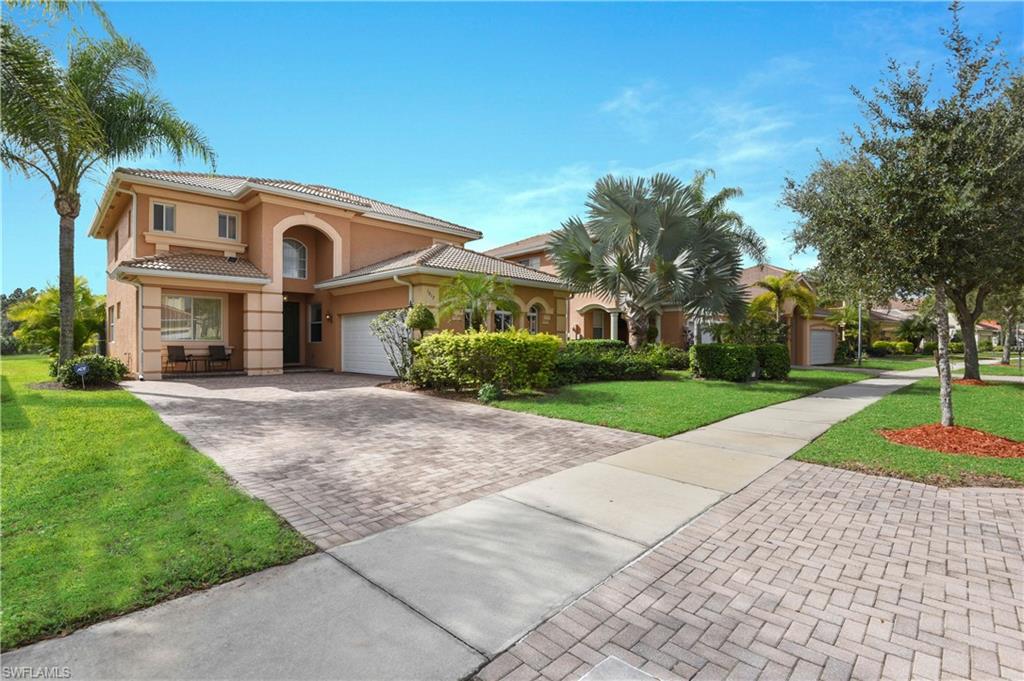 NEW ROOF, Wonderful Lakefront Pool Home in Valencia Golf & Country Club! Meticulously maintained home that offers a fantastic floor plan with plenty of space for living and entertaining.  The Gourmet kitchen features designer cabinets, granite countertops, breakfast nook, volume ceilings, crown molding and upgraded tile flooring. Family room features built-in entertainment center, Over sized Master Suite has private bath, jetted tub and separate shower.  Upstairs Features Living/Loft area, under staircase storage room.  You will love the amazing outdoor living space w/ an extended screened lanai featuring a heated pool, new pool heater, spacious pool deck, and a gorgeous view of the lake. Mature tropical landscape, epoxy floor in garage, hurricane grade garage door. Valencia Golf & Country Club is a guarded & gated community that features a newly renovated 18-hole public golf course. Enjoy the views without the golf course fees.  Amenities for the community include pool, fitness center, billiards and a theater. New Roof will be installed before closing.