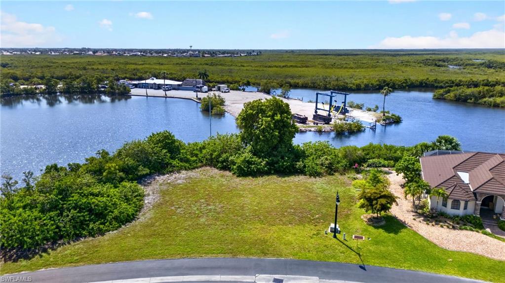 Beautiful oversized waterfront lot located in the gated community of Seaman’s Point in Punta Gorda. With sailboat access through Alligator Creek to Charlotte Harbor, you can be out to open water in just minutes from your future backyard.
This property offers the perfect setting to build your Florida dream home and enjoy boating, fishing, and gorgeous waterfront living year round. Seaman’s Point is a private gated community known for its beautiful homes and peaceful atmosphere, while still being conveniently close to US 41, downtown Punta Gorda, restaurants, shopping, and entertainment.
Opportunities like this are becoming harder to find, especially in a gated waterfront community with quick access to open water. Come take a look and imagine the possibilities.