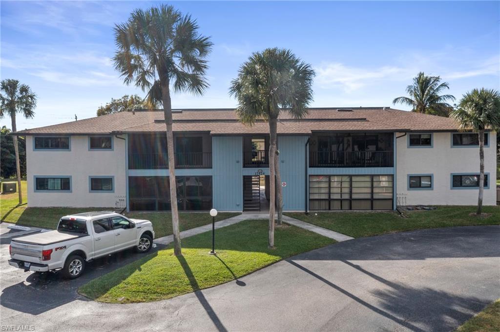 NO Flood damage to this 2 bedroom, 2 bath condo located off Island Park Road. The Florida room off the living room, overlooks the Lake. Laminate (wood like) flooring throughout, carpet in the bedrooms, bedroom windows hurricane impact.   Washer/Dryer. Royal Woods community has two lovely outdoor pools, tennis courts, shuffleboard. Great location in South Ft Myers that is centrally located and close to everything. Minutes to some of the best Beaches, Nature Preserve, FGCU, Airport, Gulf Coast Town Center.