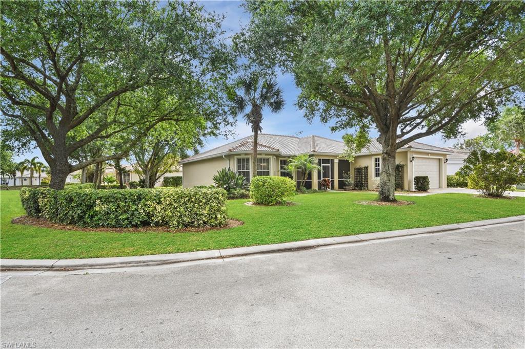Family ready lakefront single family home! NEW ROOF! NEW GUTTERS! NEW PAVERS! NEW WATER HEATER!Situated on an oversized corner lot of a low traffic cul-de-sac road w/ mature landscaping, having a road side privacy hedge & a view of the lake on the other side of the lot. Offering over 1,900sf of living space in a great room & split bedroom floor plan, this meticulously maintained & updated home features new wood plank tile flooring, freshly painted interior, and a stunning master bath remodel featuring custom shiplap walls and a contemporary designed soaking tub. The beautifully remodeled kitchen hosts quartz counters. designer cabinets w/ tall uppers, tile backsplash, and stainless steel appliances. If you love outdoor living while having all the conveniences of deeded neighborhood life then this home is for you w/ a screened front lanai, spacious screened rear lanai, large side yard, and a huge open lanai offering a peaceful view of the lake. Forest Park offers a pet friendly atmosphere and has a community center w/ pool & a fitness room. Near the heart of Naples with luxurious shopping, beaches, NCH hospital, and any variety of high quality restaurants!