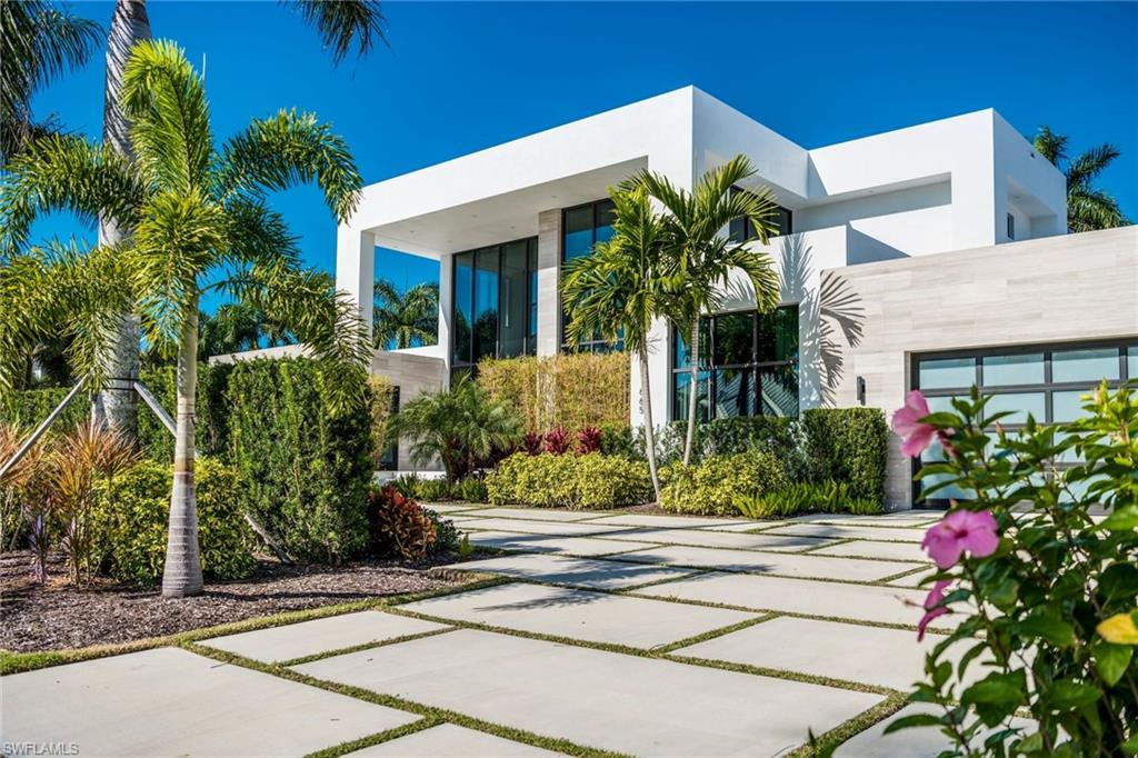 H.14050 - Tucked in its own tropical oasis w/in the prestigious Park Shore neighborhood lies this newly built contemporary masterpiece that blends clean lines and timeless styling, creating a distinctive home with no equal. An open floor plan w/ walls of glass let in copious amounts of light and nature creating an ideal entertainment home. The home features exceptional high end finishes and attention to detail that make this home one of a kind. The features include: 4 En-suite bedrooms + Study & workout room, ground floor Master, a chef’s kitchen with large island, custom German ALNO cabinets, quartz counters, Thermador dual wall ovens, induction cook top, coffee/espresso system, wine cooler, & 2 dishwashers. The master suite is highlighted by an elegant edgeless shower and free standing soaking tub. The backyard is a sanctuary with an infinity edge spa,large sun deck & oversized sun shelf surrounded by lush landscaping. The interior/exterior design encompasses all the unique products and finishes to make it an ideal setting for living the "Naples Lifestyle". Park Shore is centrally located just 4 miles to downtown Naples 5th Ave & 3rd St areas or 4.5 miles to Mercato's night life.