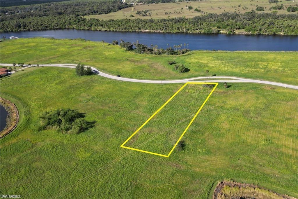 Build your dream home nested on a 1.4 acre lot, located in the gated riverfront community of Caloosa Preserve. This fully cleared, high and dry property is only a few steps away from the community's boat ramp, directly on the Caloosahatchee River. Caloosa Preserve offers over sized parcels for homeowners looking for the quiet old Florida living, with the privacy and security of a gated community.