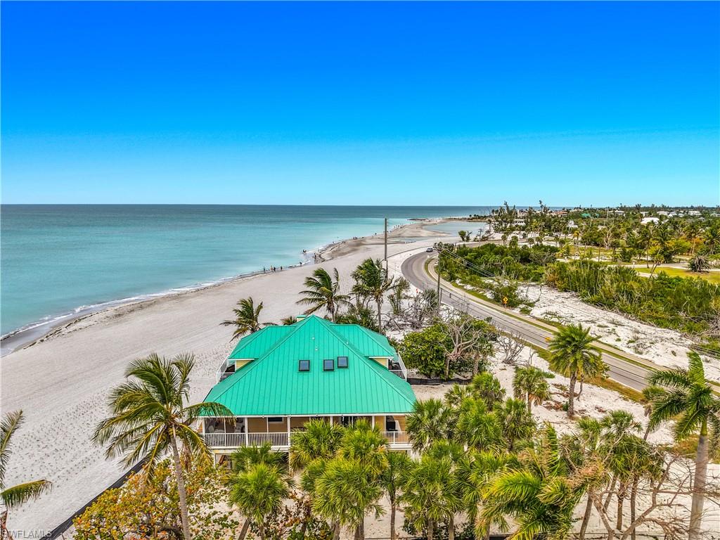 RARE Gulf-front opportunity at the very end of Sanibel Island before the Captiva bridge. This ~0.69-acre beachfront property offers unmatched privacy, panoramic Gulf views, and direct access to newly widened, renourished beaches in one of Southwest Florida’s most exclusive coastal locations.
One of the most geographically unique locations on all of Sanibel Island, where the island ends, privacy begins, and the Gulf stretches endlessly before you.
Positioned on an expansive ~0.69-acre Gulf-front homesite, this property sits at the westernmost edge of Sanibel before crossing into Captiva Island, offering a level of seclusion and prestige that is simply unmatched. This is more than a home, it’s a front-row seat to one of Florida’s most iconic coastal landscapes.
Wake up to panoramic Gulf views, walk miles of sandy shoreline in either direction, and experience the rare quiet of a location where through-traffic disappears and nature takes over. Sanibel’s unique east-west orientation creates world-renowned beaches known for their abundance of shells, wildlife, and untouched beauty, attracting visitors from around the world.
The beaches here are better than ever. Recent Sanibel beach renourishment efforts have dramatically widened and strengthened the shoreline, adding approximately 300,000 cubic yards of sand to rebuild and enhance the beach, creating a broader, more resilient coastline that not only elevates the natural beauty but serves as a protective buffer against storm surge.
Whether envisioned as a private coastal retreat or a premier redevelopment opportunity, this property is defined by one thing above all else: Location. Location. Location.