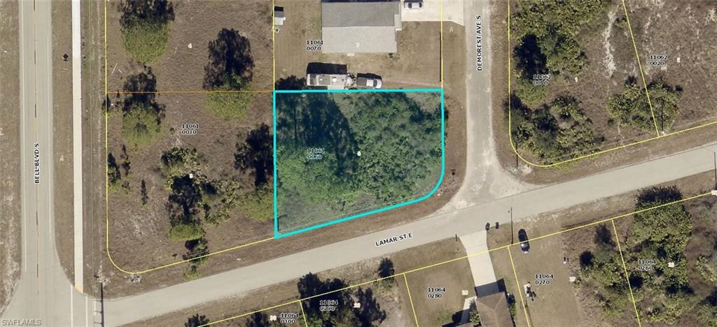 Nice Corner lot near Jaguar Blvd and Bell Blvd . Close to State road 82 near Mirror Lakes Elementary and East Lee High School.Close to the new Aldi grocery store and churches. Owner owns 3 lots behind this lot on Bell Blvd for $90,000. Great for builders or investors