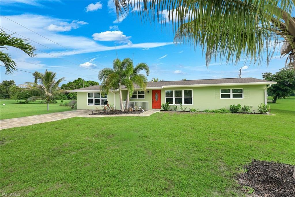 Tastefully updated, move-in ready, and perfectly positioned in the heart of Fort Myers, this oversized fully fenced corner-lot property delivers the ideal blend of modern upgrades, exceptional flexibility, and one of Southwest Florida's most convenient locations. Nestled in the established Whiskey Creek Terrace neighborhood with NO HOA fees, you'll enjoy easy access to Downtown Fort Myers, the Caloosahatchee River, Sanibel and Captiva Islands, Fort Myers Beach, white-sand Gulf beaches, top-rated restaurants, shopping, hospitals, and RSW International Airport.

This beautifully maintained home offers endless possibilities for outdoor living, RV or boat parking, future expansion, or creating your own backyard oasis. The expansive yard features a 36' x 24' concrete pad, already in place and ready for a gazebo, outdoor kitchen, detached garage, workshop, or additional entertaining space, while still leaving plenty of room for a custom pool.

Inside, you'll appreciate the extensive list of recent improvements that provide both style and peace of mind, including hurricane impact windows throughout, a new electrical system (2025), brand-new A/C, brand-new water heater, 2018 roof, fresh exterior paint, generator hookup, and a newer paver driveway. The bright, open living spaces are filled with natural light, while the beautifully remodeled kitchen showcases crisp white shaker cabinetry, quartz countertops, designer tile backsplash, stainless steel appliances, and abundant storage. The updated bathrooms feature timeless finishes, including elegant marble-inspired tile, quartz vanities, and a spacious walk-in shower.

The spacious screened lanai extends your living space outdoors, offering the perfect setting for morning coffee, family gatherings, or relaxing evenings overlooking your expansive backyard.

Whether you're searching for a primary residence, seasonal retreat, or investment opportunity, 1007 Wilshire Drive offers a rare combination of location, major capital improvements, oversized land, and future potential—all in one of Fort Myers' most desirable and centrally located neighborhoods.