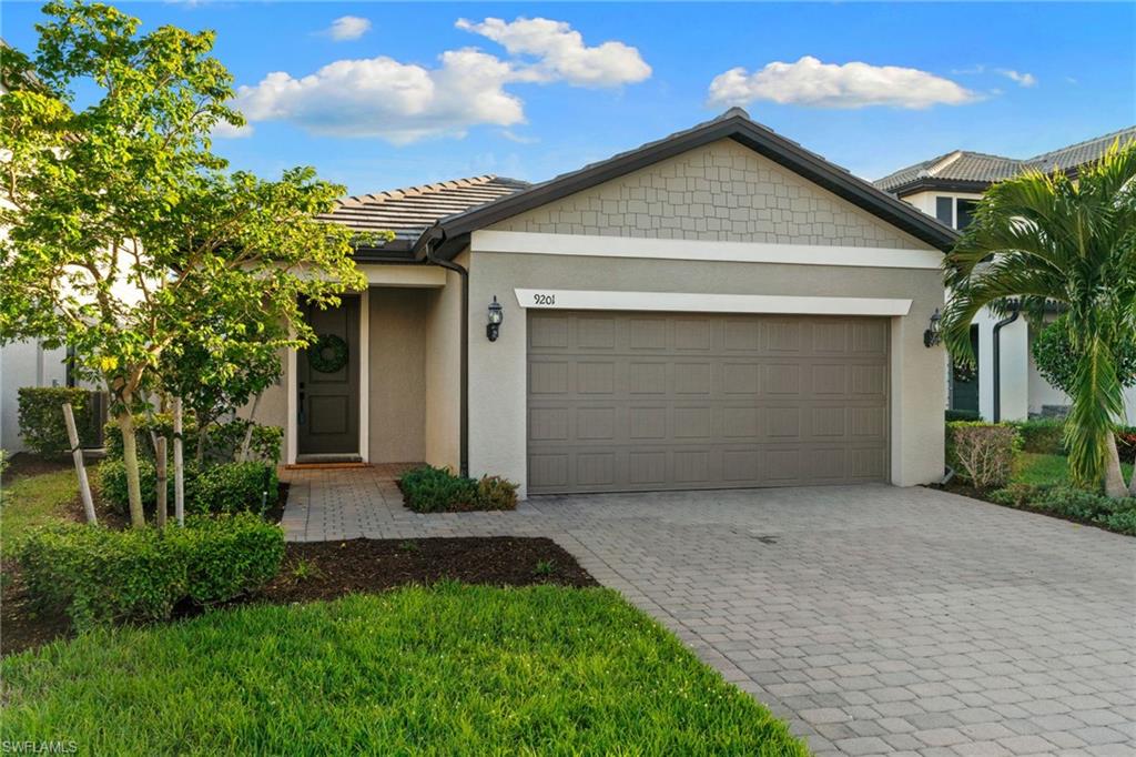 Welcome to this beautifully appointed 3-bedroom plus den, 2-bath residence tucked away on a quiet cul-de-sac within the gated community of Westbrook in Fort Myers. Thoughtfully designed with both style and functionality in mind, this home offers a bright, open-concept floor plan ideal for everyday living and effortless entertaining.

The heart of the home features a spacious kitchen with quartz countertops, upgraded cabinetry enhancements, designer lighting, and a seamless flow into the living and dining areas. A versatile den enclosed with elegant glass doors provides the perfect space for a home office, media room, or hobby area.

Retreat to the generous primary suite, where a custom-designed walk-in closet and a beautifully finished en-suite bath create a private sanctuary. Two additional bedrooms and a well-appointed guest bath offer comfortable accommodations for family and visitors alike.

Step outside to enjoy Florida living at its finest. The extended screened lanai is ideal for relaxing or entertaining, complete with outdoor lighting and space to unwind year-round. An additional paver patio expands the outdoor living area, creating the perfect setting for outdoor dining, gatherings, or enjoying the peaceful backyard surroundings.

Built with impact-resistant windows and doors for added peace of mind, this home also includes access to Westbrook's resort-style amenities, including a community pool, clubhouse, fitness center, and playground. Conveniently located near shopping, dining, entertainment, Southwest Florida International Airport, Gulf Coast Town Center, Miromar Outlets, and I-75, this exceptional residence offers the perfect blend of comfort, convenience, and Southwest Florida lifestyle.