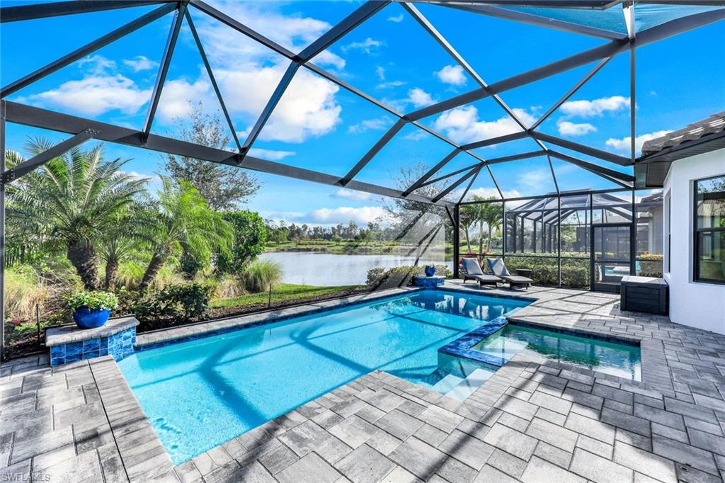 LIVE A VACATION LIFESTYLE IN ESPLANADE! FULL GOLF MEMBERSHIP INCLUDED! This "Lazio" (3+Den/3BA) offers an open great room style floorplan with two sets of sliding glass doors to the extended lanai complete with outdoor kitchen, GAS fireplace, GAS heated pool/spa, and lake views! A long list of special features include: extended kitchen complete with quartz countertops, GE Cafe appls incl GAS cooktop, wall oven, & wine cooler; oversized tile floors throughout & luxury laminate wood floors in the bedrooms; extended two car garage (20'x24'); Cambria quartz countertops in the kitchen & baths; in-ceilings speakers; smart home lighting controls; crown molding; glass front door w/ side lights; Master Bedroom bay window; & more! Esplanade is a true "Lifestyle Community" with something for everyone: resort pool complete with cabanas & poolside "Bahama Bar"; tennis; pickleball; bocce; Koquina Day Spa; fitness center; dog parks; 14 miles of bike/walking trails; 18 hole private golf course; 15,000 Sq Ft clubhouse featuring restaurant, bar, wine tasting room, wine lockers, & Starbucks style cafe! TOTAL HOA fees just $1035/month & includes landscaping, ALL club amenities, & golf dues.