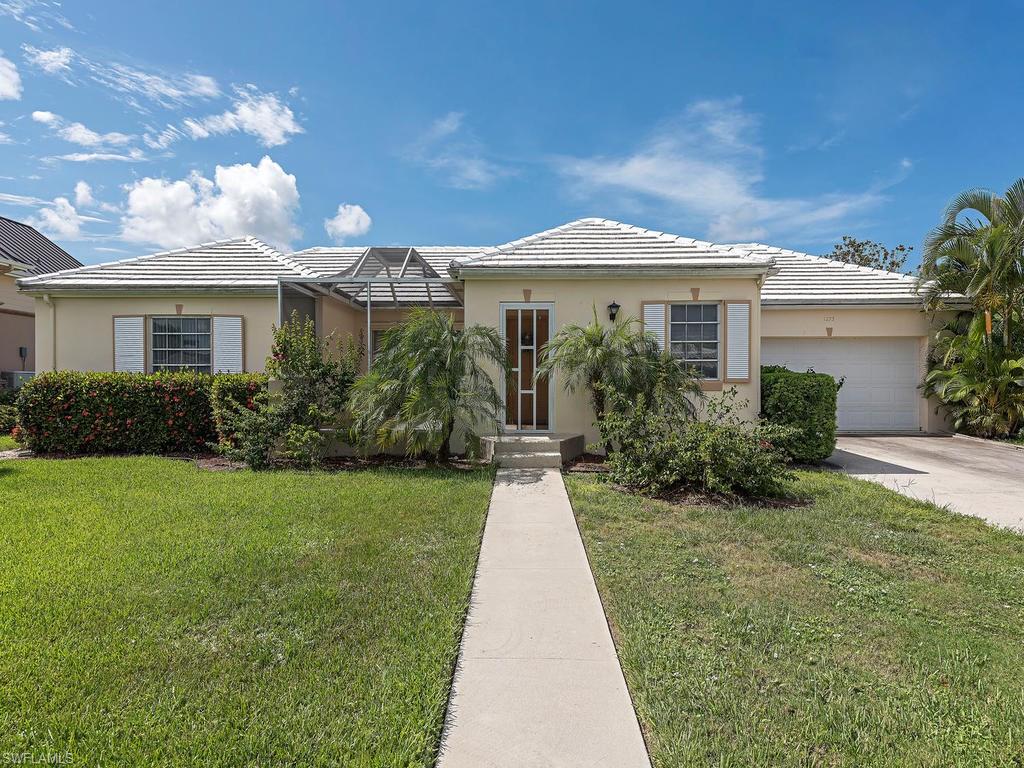 Golf course view from this spacious 3/3 home with SE exposure. Each bedroom has it's own bathroom.
2 car garage. Fully furnished and turnkey, just bring your suitcase. New screen enclosure with panoramic screens. View of golf course could be improved by cutting the privacy-landscaping.