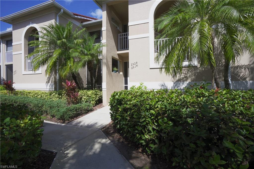 WOW!! NEW IMPROVED PRICE, This Lovely second floor veranda, with front and back lanai. Nice view of lake and golf course. Tile throughout dining and living room. Carpets in bedrooms and den. New refrigerator, dishwasher, and microwave. Kitchen with breakfast bar and beautiful eating area with bay windows. Master suite features walk -in- closets, dual sinks and walk- in shower in bathroom. A very short walk to pool. Enjoy the renovated Club House and Golf Course. We have tennis, golf, bocce courts, sidewalks, and great exercise room. Just a short walk to the Cypress Woods Clubhouse where you can enjoy the resort style pool, clubhouse, golf, fitness center, pro shop, putting green, grille room or dining room! The Cypress Woods is a bundled golf community and features the unique Gordon Lewis 18-hole / Par 72 golf course! In addition to golf, there are 2 tennis courts, 8 pickleball courts, 2 bocce courts, walking trails, and only a short 6 miles to the beautiful beaches of the Gulf of Mexico for magnificent sunsets. Close to restaurants, marinas, Mercato, Waterside Shoppes, and RSW airport. Perfect for a golf vacation, 2nd home, vacation rental, southern office, or year 'round home!