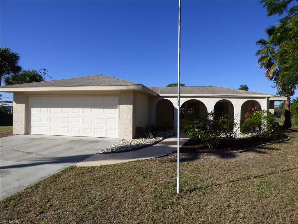 Affordable 3 bedroom 2 bath pool home in Country Club East, canal in rear for privacy, freshly painted exterior, covered porch in front, nicely landscaped, double door entry, new central heat and air in 2016, formal living and dining room plus family room, indoor laundry room, tankless water heater, wood laminate and vinyl floors, walk in closet in master bedroom with private bathroom, breakfast bar in kitchen, screen enclosed in ground pool/spa with auto vacuum, plenty of deck space and covered lanai by the pool, large workshop/storage shed with roll up door, 3 ceiling fans, in need of some updating and cosmetics in the kitchen and baths but priced accordingly, quiet dead end street-low traffic.