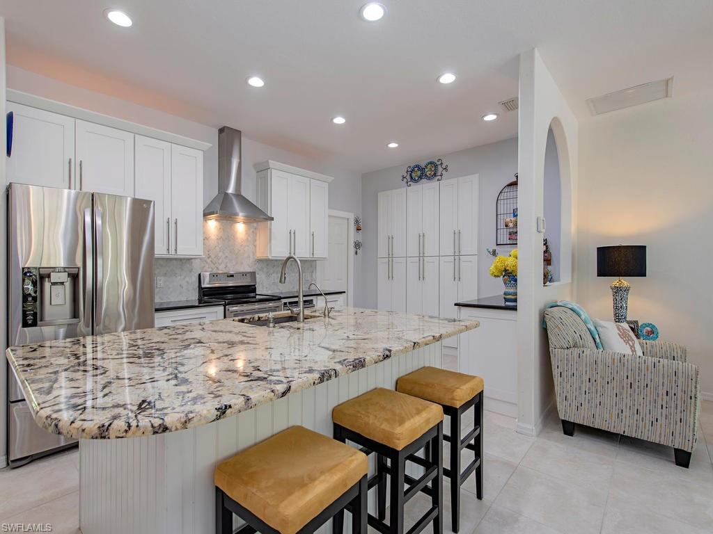 H.14812 - Tranquil country living awaits! A short drive up your secluded private drive sits this meticulously maintained and tastefully updated pool home. Abundant windows and sliders paired with volume ceilings make for a bright and cheerly ambiance. Custom Nassau built pool, spa and sundeck highlight the outdoor living space. Both inside living and outdoor living make for great entertaining. Nestled on a heavily wooded and landscaped lot this home offers a very private and secluded feeling. Fully fenced yard is perfect for pet owners. New roof and pool cage offer the assurance of maintenance free living for years to come. Life, pet, and garden friendly and no HOA rules or fees. Prime close in location just south of White Blvd. This home is in pristine condition for its below market price and will not last long. Please DO NOT approach house without an appointment.  Just give us a call.