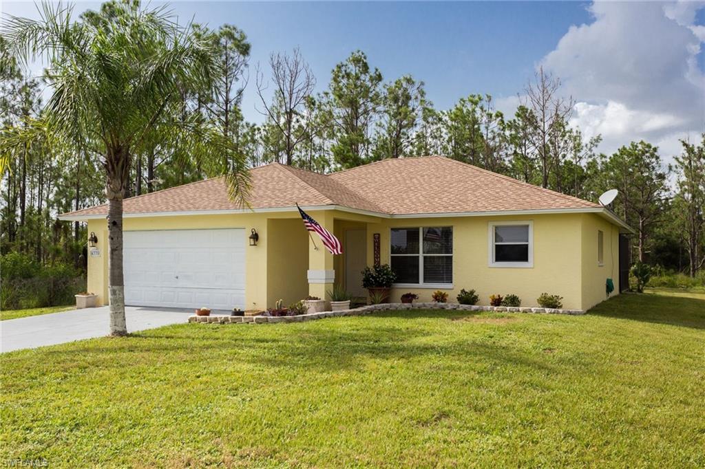 Gorgeous Golden Gate Estates POOL home looking for it's new owners! 3 bedroom, 2 bathroom, 2 car garage, screened in patio, fully fenced yard, NEW roof, beautifully maintained, 3 yr old AC and water system. Enjoy estates living on 1.14 acres of property and the convenience of the new Publix shopping plaza in this fast growing area. You won't want to wait on this one! Schedule a tour today!