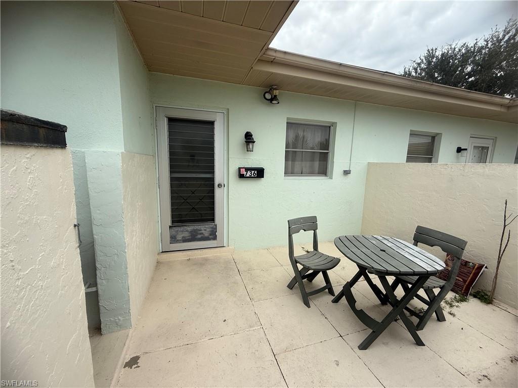 Furnished 2 bedroom 2 bath villa in Beach Club Colony with tile and laminate flooring throughout and a screened in lanai overlooking a canal for early morning coffee or relaxing evenings to enjoy the Florida weather. Call for your private showing today!