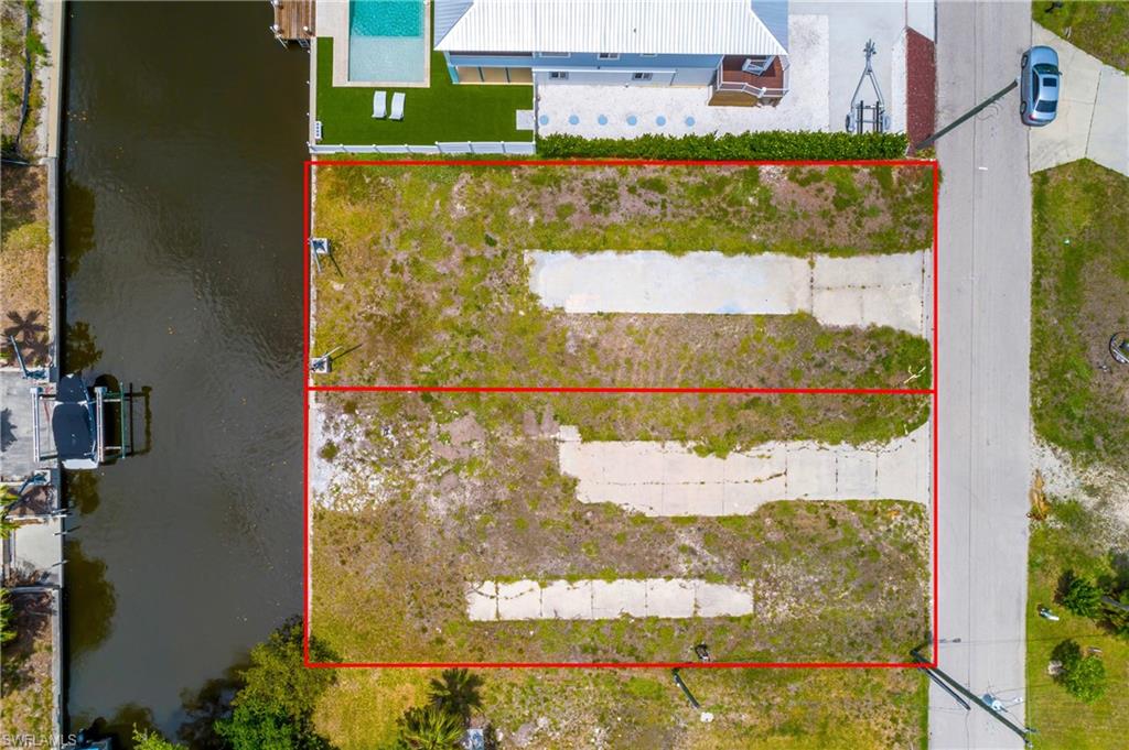 LOOKING FOR SOMETHING YOU DON'T SEE EVERYDAY? WELL HERE IT IS. TWO ADJOINING GULF ACCESS CANAL LOTS WITH NEARLY 1/3 OF AN ACRE, (12,197sf) AND 100ft. OF WATERFRONT IN ESTERO BAY SHORES!! Here's why we think this IS the best GULF ACCESS deal in all of Estero. 5 minutes to the Gulf of Mexico. Western Exposure (enjoy the sunsets). Combined lots are separately deeded, but being offered together which gives a buyer the ability to build their dream home smack dab in the middle or build two; one for a rental and one to live in. Both lots have city water, sewer and irrigation wells installed. Fantastic location, minutes away from Lover's Key, Coconut Point Mall, Hertz Arena, dining, shopping and less than 30 minutes to RSW Airport. If you're a water lover, boater, angler, nature lover, or just looking to build your dream home and not have your neighbor on top of you, here's your chance to have it all. You'll be hard pressed to find an opportunity like this, for this price, in this location, with these possibilities. It's time to make the dream come true!