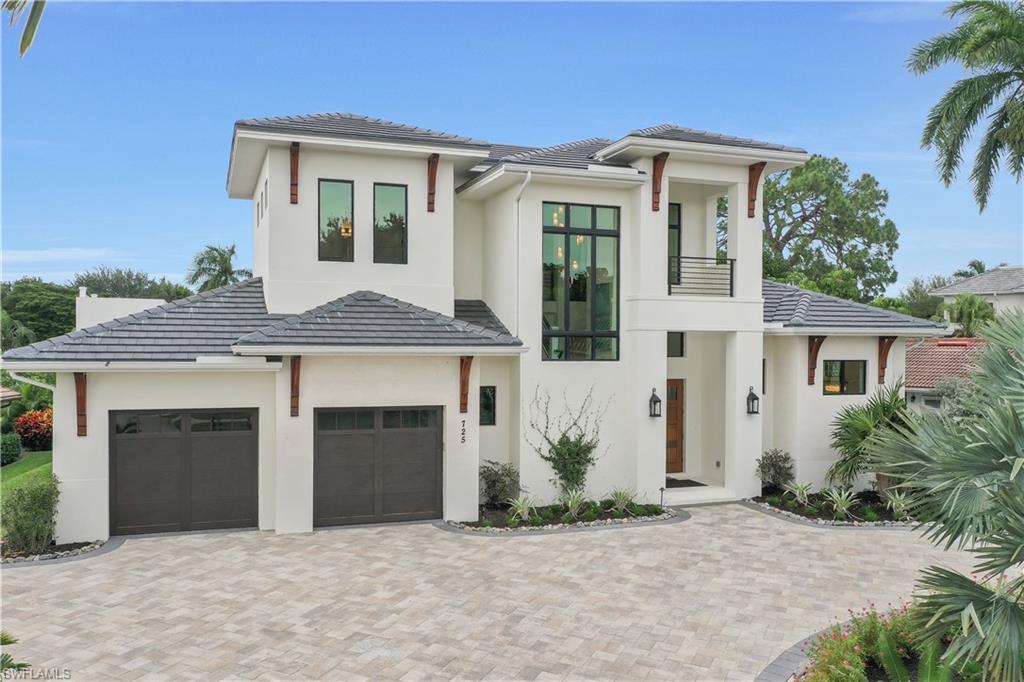Exquisitely crafted by award winning builder Milestone Development and Design, this custom home combines Old Florida coastal styling, wood tones and luxury finishes with a thoughtful floorplan for entertaining and year round living. On the main level, owners will enjoy a spacious great room with chef’s kitchen, walk-in pantry, elevator and hidden storage behind unique bookcase door. Rarely available, this plan offers a downstairs grand master suite and additional first floor en-suite connected to pool bath. Upstairs offers guests a relaxing loft space with bar, three en-suite bedrooms with balconies overlooking Park Shore. Outside, the private park provides a gorgeous backdrop to the pool/spa combo with fireplace feature wall, outdoor kitchen and electric bug screens for an impressive and inviting outdoor space. Featuring a Vantage smart lighting system, whole home sound system, 500 gallon gas propane tank and offered turn-key furnished. Point West is an intimate community of 16 homes that share a private park for unprecedented views, low maintenance living with all landscaping included, and Park Shore Beach access. DAILY OPEN HOUSES 1-4PM *Agents see confidential remarks*