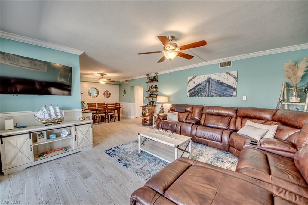Best of both worlds with this lovely, updated unit...Gulf access with water views from living room and kitchen then just a few minutes walk to our beautiful downtown Cape Coral for some shopping, dinning, entertainment and farmers market. 
Unit has been updated with new stove, new dishwasher, tile flooring throughout, tiled owners bath with rain shower, custom made plantation shutters, bathroom vanities and toilets, entire unit/paint, lighting fixture in dinning room, shiplap on dinning room wall, ceiling fan in guest bedroom, can lights in hallway, keyless front lock, updated lanai with power to TV, new electric hurricane shutters, outdoor patio and Honeywell wifi thermostat.
Parking lot blacktopped in 2021, new pool heater 2021 and dock lights in 2021.
New boat docks are scheduled to be installed in 2022 and red carpet in all building walk ways to be removed and replaced with epoxy nonslip flooring in 2022.
A great unit to call home!