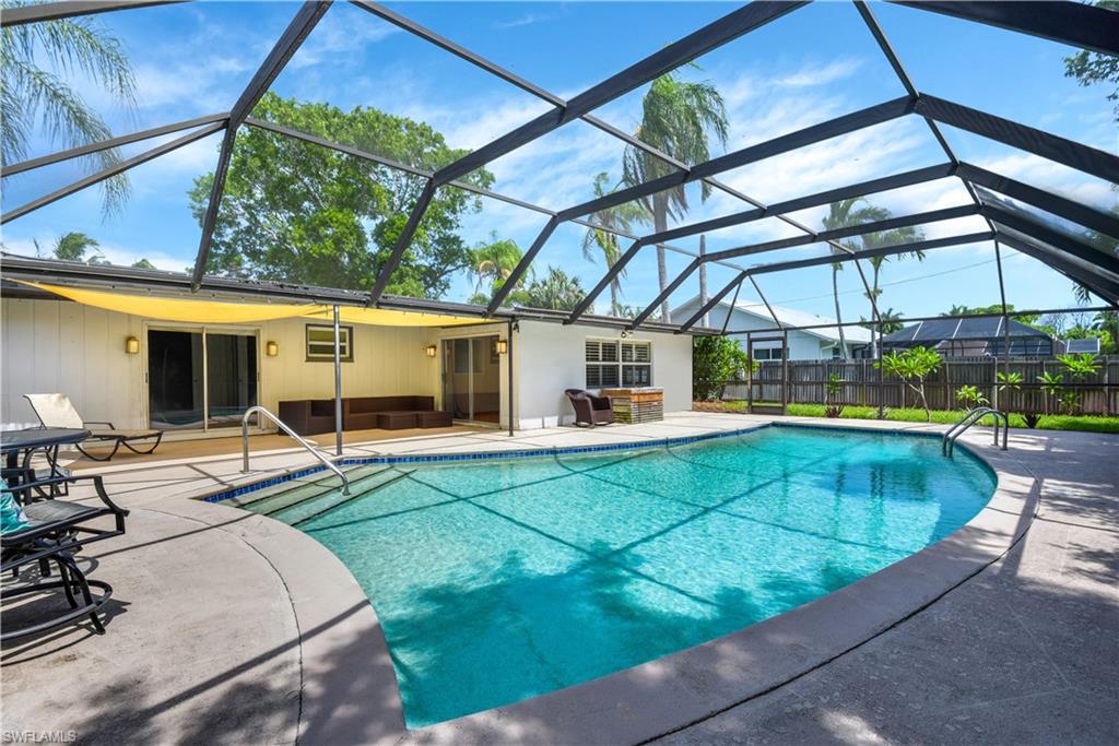 Single family pool home in highly desired Palm River! NEW a/c just last year! Offering a sprawling layout w/ living & family room design, split bedroom floor plan, large walk-in closet & renovated bath in master bedroom, dining area & breakfast bar, fenced-in backyard, and spacious pool lanai w/ covered sitting area. Palm River is situated next to LaPlaya Golf Course and is a non-gated neighborhood w/ NO HOA FEES. This area of Naples has very convenient location- close to I-75, 7 minutes from the shopping & dining of MERCATO, and less than 4 miles from Delnor-Wiggins Pass State Park.