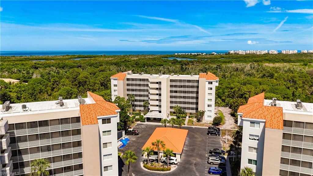 Enjoy breathtaking sunsets, beautiful Gulf views, and soaring birds from your Sixth Floor lanai. This fully furnished, beautifully decorated, west of 41 gated property is only minutes from Wiggins and Barefoot Beaches, and Delnor-Wiggins Pass State Park. Along the three-quarter mile private boardwalk, enjoy the adventures of scenic walks, pleasant bird watching, and excellent fishing. the winding boardwalk takes you through the manggrove forest preserve to tidal backwaters. Owner has just installed a new 65" Smart TV in the living room and a new Smart 60" TV in the master bedroom. The second bedroom has a Roku smart streaming device with a 50" TV. Enjoy resort-style amenities including a pool, outdoor grilling, pickle ball, tennis, fitness center, clubhouse, library, walking trails, and more! Everything you need or want for a wonderful experience of the Naples lifestyle.