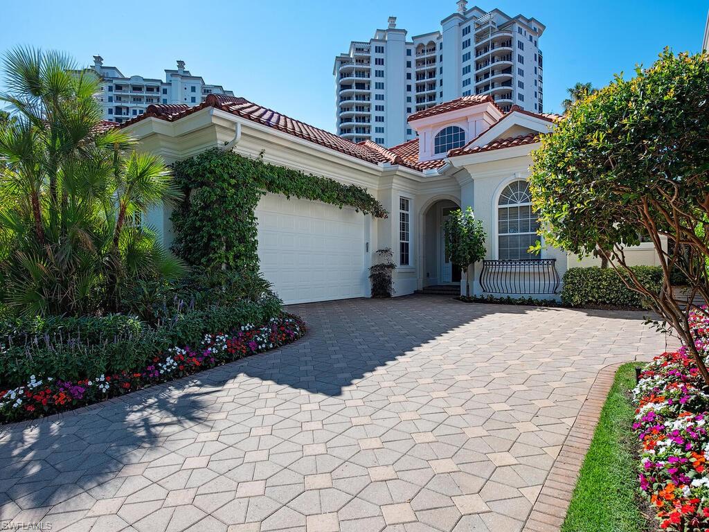 Nestled in famed Bay Colony awaits your very own ranch-style oasis.  This private villa boasts nearly 2900 feet of luxury, meticulously remodeled in 2023. A two car garage boats new epoxy flooring and provides ample room for your most prized toys. Coveted southern exposure on the pool and spa area ensure sun-washed tranquility year-round. Additionally, there is a temperature controlled, walk-in wine room for your fine vintage wine. See you soon.