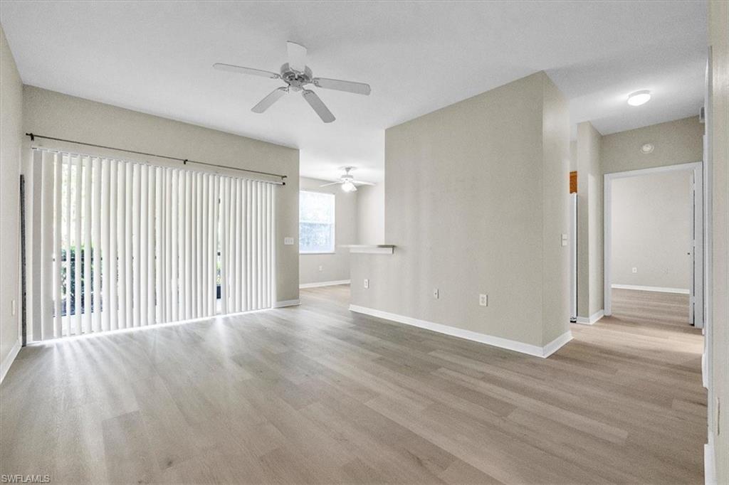 One or more photo(s) has been virtually staged, AI generated or rendered.   The BEST DEAL in Naples!!!  Don't Miss Out!!   Beautiful First-Floor One Bedroom One Bath condo in the desirable gated community of Fairway Preserve at Olde Cypress. This move-in ready unit features NEW Luxury Vinyl Flooring (May 2026) and a desirable floor plan including an eat-in kitchen, and a great room. Newer Refrigerator and Range (2025). Relax on your private, screened, and tiled lanai overlooking a serene, wooded preserve landscape.  Residents enjoy many neighborhood amenities, including a resort-style community pool and spa, an exercise room, and an indoor racquetball court. The spacious community room features a full kitchen setup with ample tables and seating, making it perfect for resident events or private parties. Outdoor recreation activities also include two Bocce Courts and Horseshoes.  The location is very convenient in North Naples close to Logan Blvd, Collier Blvd, I-75, Shopping, Restaurants, and the Gulf Beaches. An ideal opportunity for investors, vacation home seekers, or professionals looking for a prime location and a peaceful setting. Act Fast! This condo is priced to move and won't last long. Call for your showing appointment today before it's gone!