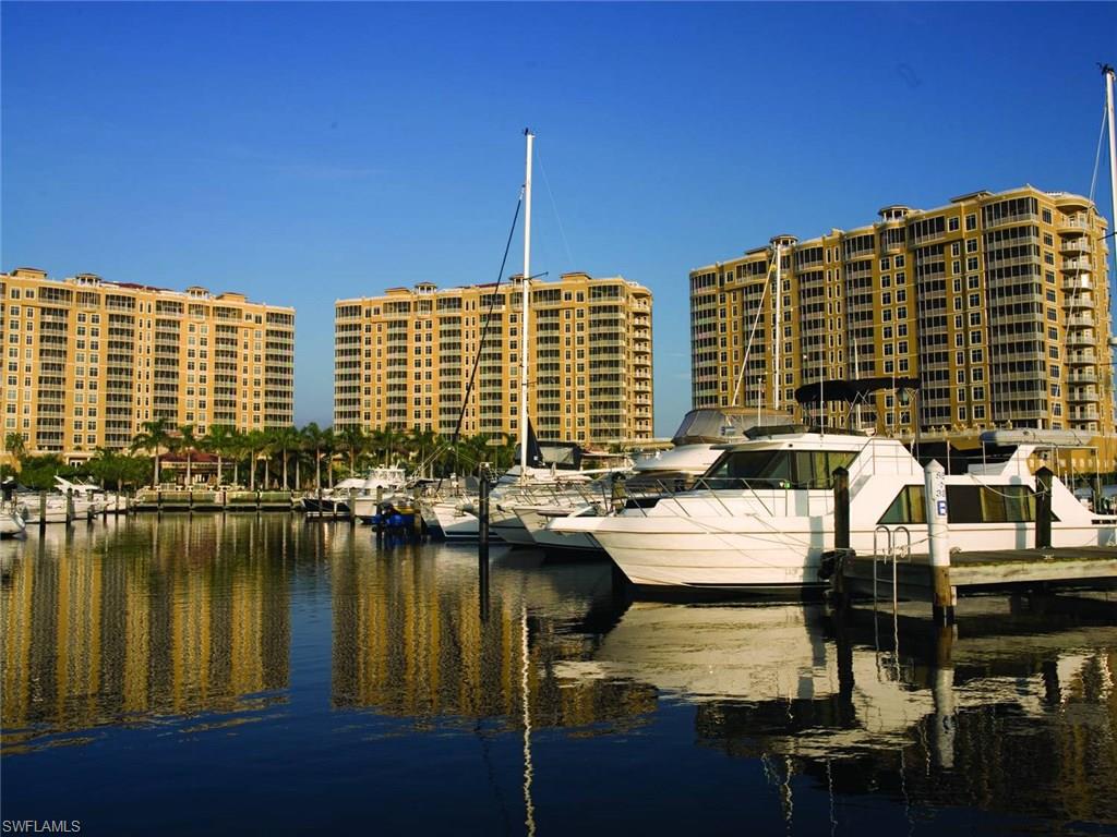 Pack your bag and enjoy the flight to Southwest Florida's best kept secret!! You'll find the lifestyle of a lifetime awaits you! Enter your elevator into a private secure foyer that opens into a beautifully decorated 9th floor turn-key Bonaire unit. Enjoy spectacular  open water views of the River, intracoastal and Marina.  In the evening savor sunsets from your second grand view balcony. This former model unit has three King Suites, one Queen suite or den, three and a half baths. Serve your guests from the built-in bar area while enjoying your favorite music from a sonos sound systen. New HE washer and dryer will handle all needs.  Park your car in your private enclosed 2-car garage! A true Boater's paradise among elegant resort surroundings with all the amenities. Walk to waterside restaurants, shops, gallery and Marina.