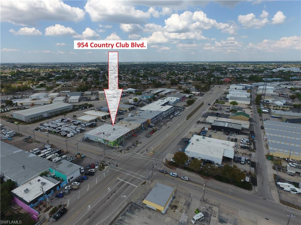 This industrial building measures 3,700 sf (37' X 100'). The office portion faces Country Club Blvd., has two separate glass door entrances. The door on the right would be considered the main entrance immediately walking into the lobby, 3 offices, staging area near shop, a small storage room and restroom. The door on the left allows a private entrance to the massive conference room which isn't the only option to gain access since access is also available just off the lobby. Warehouse is wide open space with two overhead doors facing the alley. Ready for occupancy.