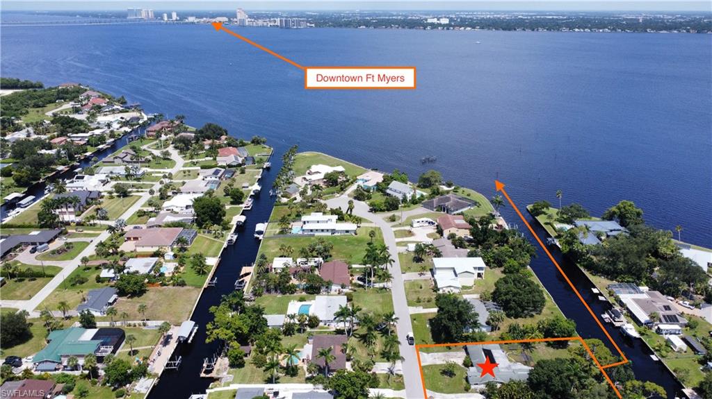 Rare direct Gulf access opportunity on an oversized ½ acre lot with 100 feet of waterfront and boat ride down the Caloosahatchee to the open Gulf. This is suitable for a builder, investor, or end user. The existing 4-bedroom, 3.5-bath, 2,871 sq ft concrete-block ranch (plus den) has been professionally gutted to the studs following Hurricane Ian, removing all drywall, insulation, flooring, cabinets, fixtures, etc. This creates a unique chance to renovate to current codes, elevate, or build new in a neighborhood where properties rarely become available. Rebuild vs. Teardown — you pick the path: Renovating requires rebuilding to current code, including raising the elevation, if you restore the existing structure. Given the strong bones (block walls, existing utilities, recent impact openings), many investors will see a full renovation as the most capital-efficient path. Others will prefer to maximize square footage and modern design by clearing the lot for new construction — land value alone justifies the purchase in this market. Surrounded by established homes and offering unmatched boating convenience, this property is perfect for investors, builders, or buyers seeking a waterfront lifestyle with long-term upside.  Do Not Walk Property without permission.  All property tours must be accompanied by owner.