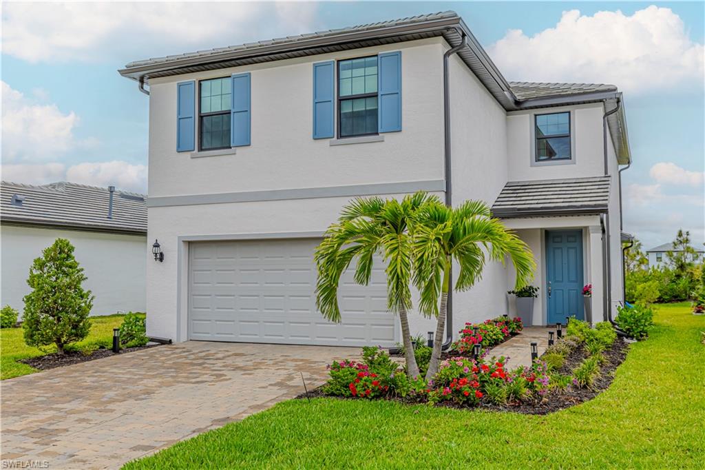 Luxury new house in Terreno at Valencia North Naples is available for a long term rent! 
This stunning 5 bedroom 2.5 bath, 2 car garage home available for a long/short term rent now! This two-story Trailside provides ample storage space, an upstairs loft, covered lanai, and owner's suite with large walk-in closet. On the first floor is an airy kitchen with island with a café area and gathering room, while a room off the kitchen is the perfect guest suite. A staircase leads to additional bedrooms, the owner's suite, and loft. Upgrades include white cabinetry with quartz countertops, large shower extension in the owners suite, extended covered lanai, oversized garage with epoxy flooring, 8' interior doors, laundry cabinets and countertop and so much more! Room for pool to be added after closing. Terreno by DiVosta is a for those looking for a resort lifestyle community with private amenities and modern houses. Neighborhood features include 15,000 sq. ft. grand clubhouse with large community room for events, catering kitchen, state-of-the-art fitness center, exercise studio, 8 pickleball courts, 2 tennis courts, dog park, playground, firepit lounge, dog park, resort style pool, lap lanes, heated spa, full-service restaurant bar & grill, food truck drive-up, 18-hole public golf-course next door & more! Next to a great schools, new Publix, Aldi and more!