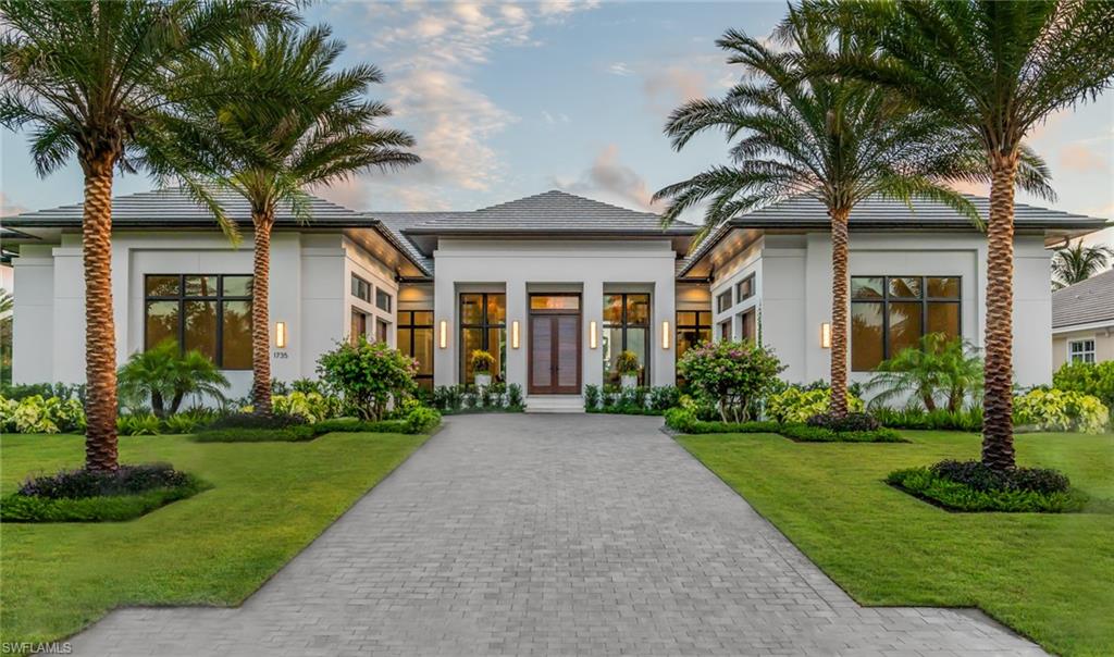 Located on an oversized waterfront lot with long western views, this newly built home is designed by Falconer Jones and built by BBA Development. This single story home has four bedrooms all en-suite, an office, media room and pool cabana. The kitchen opening to the large great room, has a 60 inch wolf range, Subzero Fridge and Freezer, wine refrigeration and ice maker. The butlers kitchen has a Miele coffee maker and speed oven with two dishwashers. The large bank of sliders opens the home to a wonderful outdoor living area complete with summer kitchen and fireplace. The pool deck is finished in shell stone with leads down to a dockside fire pit and deck/dock overlooking the bay with a jet ski lift and 16,000 and lift for the ultimate boating experience. Other features include electric roll down screens, shutters, Elan G home automation, Lutron lighting system, generator, mahogany front door and a four car garage. Located just blocks to the beach and Gulf for the ultimate Naples lifestyle.