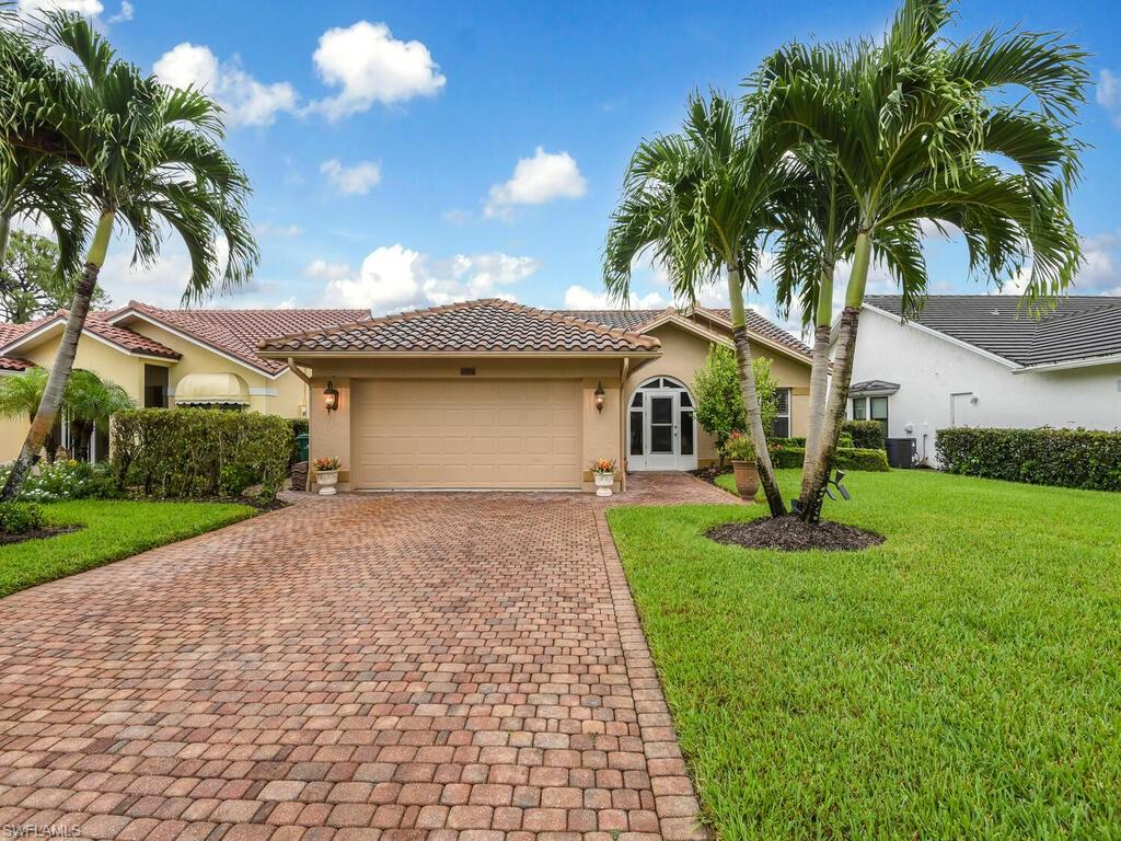 Fabulous Remodeled home with expansive water views.  Professionally remodeled, featuring granite countertops, custom cabinets, butlers pantry and tons of storage. Ceramic plank tile flooring throughout, Remodeled baths with custom cabinets and granite countertops.  Enjoy the added space with a totally enclosed Florida room and built in bar for entertaining family and friends.  Enjoy this private and quiet lot, featuring lake views with newly added fountains.  Large covered lanai and screened cage, as well as enclosed front porch. New Tile roof installed 6 yrs. ago. Foxfire is a gated bundled golf community.  With 27 holes of golf and a remodeled 20,000 sq. ft. Clubhouse and Restaurant.  Large community pool, Har-Tru tennis courts and fitness center.  Priced to sell, don't miss out.