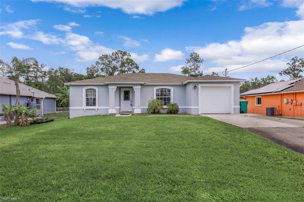Don't Miss This One!  Remodeled and Updated Kitchen and all Baths.  New interior and exterior paint.  R/O system and Roof only 4 years old.  A/C compressor only 3 years old.  Front yard has irrigation system.  The garage was converted to a master suite (square footage not included in total sq. ft).  Separate rear entrance to a mother-in-law suite, but could easily be accessed into main living area if new owner desires.  Lots of closet space.  Washer and Dryer located off the kitchen inside the home.  Large yard with fruit trees or add a pool if you desire!  Plenty of Parking areas too.  Plus a great location close to Publix and Valencia Country Club Golf Course.