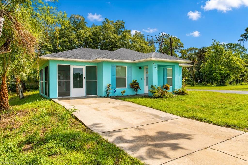 Charming LaBelle Cottage on a Corner Lot! 
This darling concrete block cottage offers approximately 1,000 square feet of comfortable living space and is ideally situated on a comer lot with paved road frontage on two streets. Built in 2010, the home features a durable shingle roof, a 2022 HV AC system, and a convenient location with easy access to LaBelle, Clewiston, Fort Myers, Lehigh Acres, and surrounding areas. 
A welcoming 6' x 8' front porch leads into the open-concept living, dining, and kitchen area, creating a bright and inviting space for everyday living. The home also features a spacious 1 0' x 19' screened porch on the south side, accessed through the living room, providing the perfect spot to relax, entertain, or enjoy the Florida breeze. 
The thoughtfully designed floor plan includes two generously sized bedrooms, each with oversized closets, a handsome full bath with shower, and a separate laundry room that also houses the home's mechanical systems for added convenience. A unique feature is the man door leading to the screened porch, complete with a built-in cat door for your furry family members. 
Whether you're looking for a starter home, seasonal retreat, or investment property, this well-­maintained home offers affordability, comfort, and a convenient location in the heart of Southwest Florida.