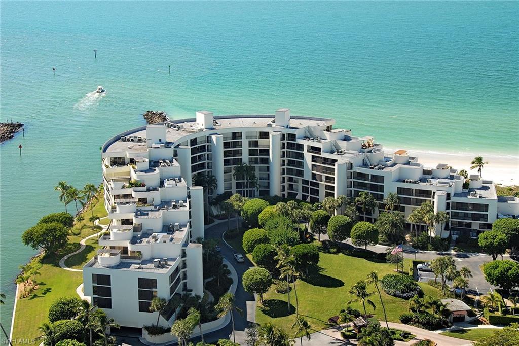 Live right on the beach! Direct westerly views of the Gulf. Watch and listen to the soothing sights and sounds of the Gulf every moment of the day! Spacious one level first floor, open concept plan. Features 2 bedrooms plus den or 3rd bedroom. 2 and 1/2 baths and an open balcony at sea level! Views of the Gulf from every angle of the great room, kitchen and the master suite. Spectacular community of Admiralty Point with modern amenities including fitness room, pools and tennis. Private entry and covered parking. Only minutes to Venetian Village or Old Naples.