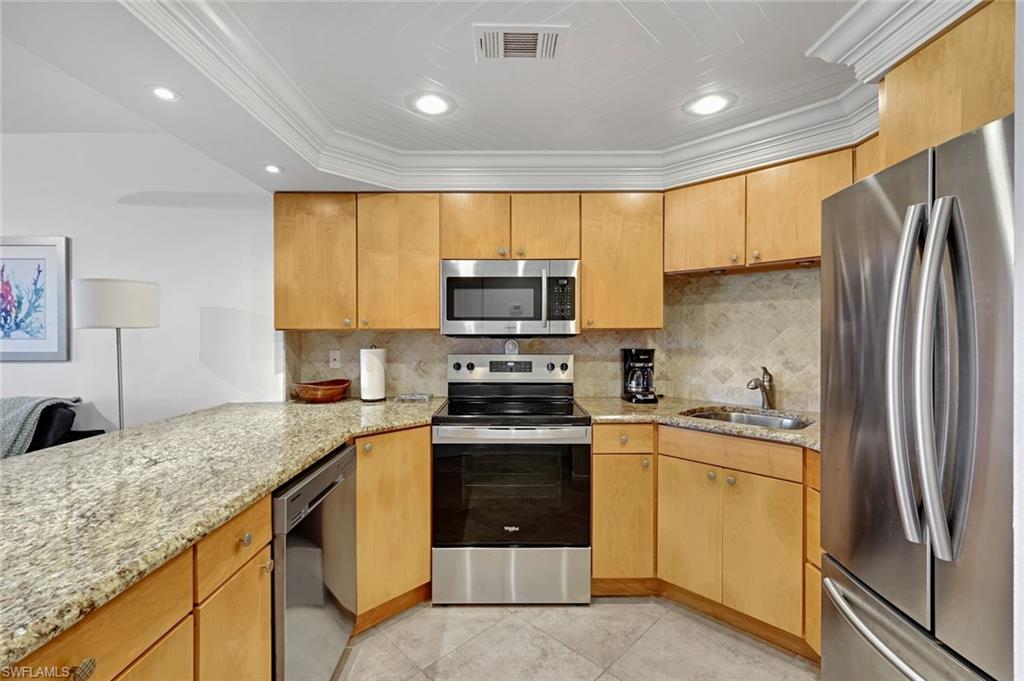 This beautifully renovated two bedroom, 2.5 bath condominium is one of the most unique properties in Vanderbilt Beach. Set up like a townhouse, this 2 story property boasts GULF VIEWS and is within walking distance to the beach. Beautifully renovated with a new kitchen with breakfast bar seating, new appliances, new air conditioning, high-end designer track lighting in main living area, new showers and updated flooring. This condo is equipped with everything you will need allowing you to sit back, relax and enjoy everything Naples has to offer. Vanderbilt Towers is perfectly located and is minutes from Southwest Florida's top shopping and dining at the Mercato & Waterside Shops as well as a short drive to Downtown Naples. Do not miss out on this one-of-a-kind property!