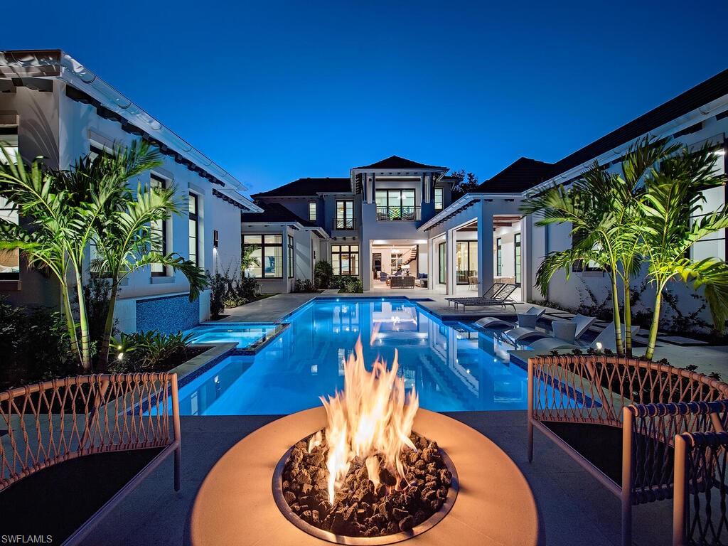 A rare offering in Old Naples, this exceptional newly constructed residence occupies a premier position on Gordon Drive, with no immediate neighbor to the south—affording remarkable privacy and abundant natural light throughout the year. Conceived by Stofft Cooney Architects, masterfully built by A. Vernon Allen Builder, and thoughtfully curated by Ficarra Design Associates, 1795 Gordon represents architectural excellence in one of Naples’ most coveted enclaves.
Spanning nearly 7,400 square feet of air-conditioned living space, the home seamlessly balances sophistication and comfort. Savant home automation supports a modern lifestyle, while bespoke cabinetry by New Style Cabinets, Inc., wide-plank oak flooring in warm natural tones, and a refined palette of stone and organic materials establish an atmosphere of understated elegance and tranquility.
Outdoors, the expansive corner lot has been artfully utilized to create a private resort-style setting, complete with lush green space, a lap-lane pool, and an inviting covered outdoor living area. A detached en-suite cabana further enhances the sense of retreat, offering versatility for guests or quiet relaxation. Convenient access from 18th Avenue South ensures ease of arrival and privacy.
Just moments from Naples’ pristine white-sand beaches and the renowned boutiques and dining of historic Third Street South, this residence offers a rare combination of location, craftsmanship, and refined coastal living.